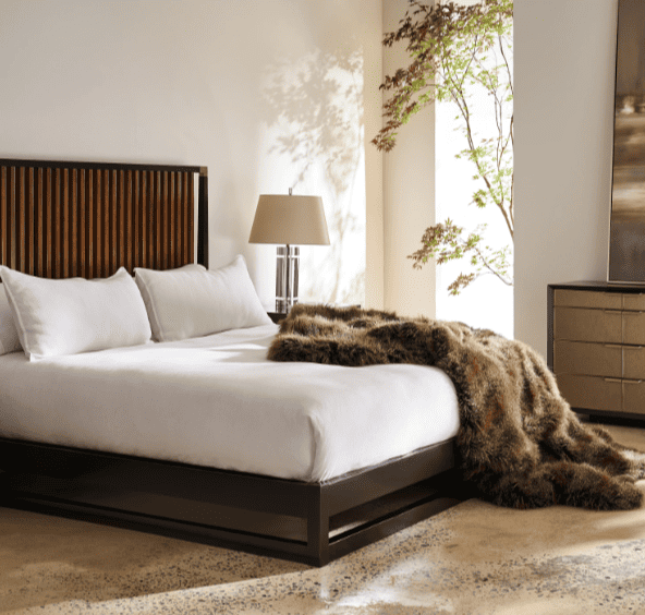 caracole brown bed with side tables