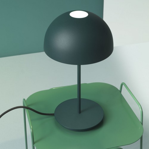 Table lamp covered with black cover